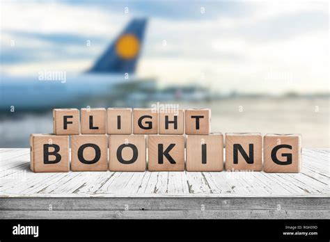 flight booking sign   airport   plane   background stock photo alamy