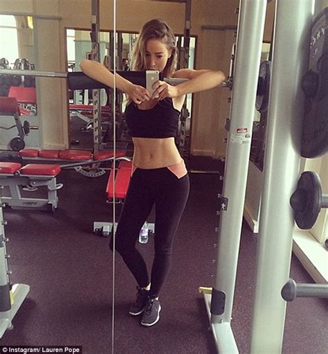 Lauren Pope Shows Off Her Toned Stomach In A Gym Selfie
