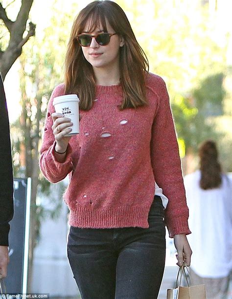 dakota johnson wears demure outfit for lunch after fifty shades of grey video daily mail online