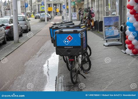 dominos pizza delivery bicycles  amsterdam  netherlands  editorial image image