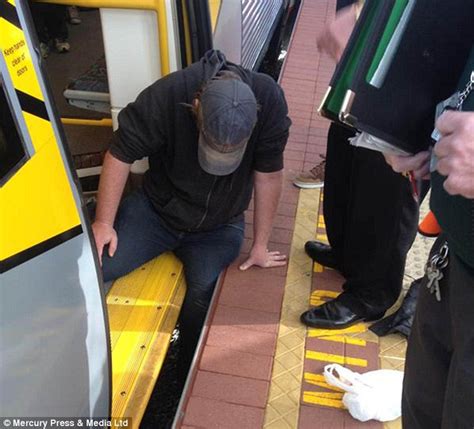 Perth Commuters Lift Train To Free Man S Leg Daily Mail Online