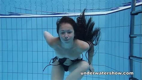 cute umora is swimming nude in the pool xnxx