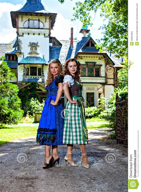Two Beautiful Girls In Oktoberfest Dirndl Stock Images