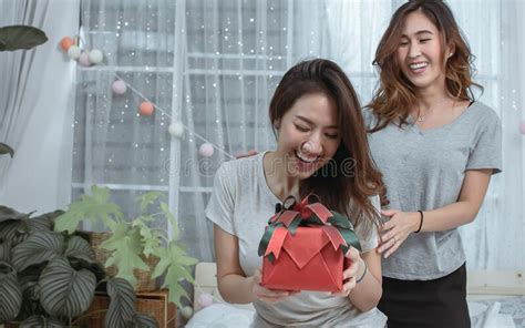 Woman Giving Surprise Her Girlfriend Lesbian And Love Concept Stock