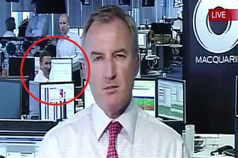 banker caught looking at porn during live tv report in