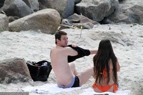 lionel messi shirtless with girlfriend antonella roccuzzo the beach fear of bliss