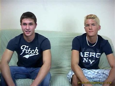 cute twinks stroking dongs on couch