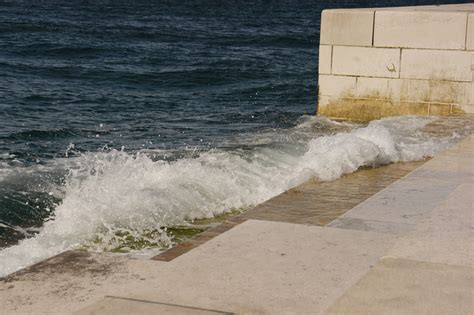 sea organ concrete jetty    crashing waves weburbanist
