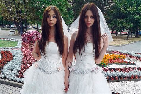 identical bride and groom both wear wedding dresses for