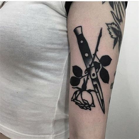 Rose And Switchblade Tattoo On The Left Arm By Ignacio Ttd Tattoo