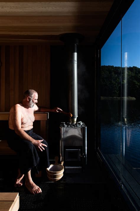tasmanias floating sauna   lakeside spa  soaking   views