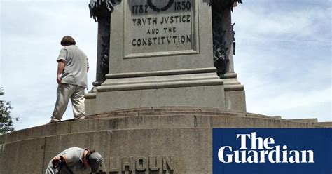 confederate monuments tagged with anti racist messages in pictures