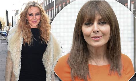 from dark and sleek to beachy blonde waves carol vorderman 54 oozes sex appeal with latest