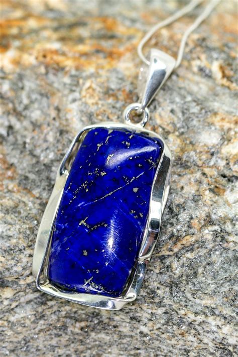 amazing lapis lazuli pendant fitted  sterling silver setting