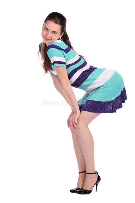Girl In Stripy Blue Dress Bend Forward Side View Picture Image 18226160