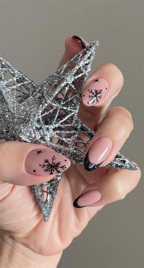 festive fingertips  enchanting christmas nail ideas black french