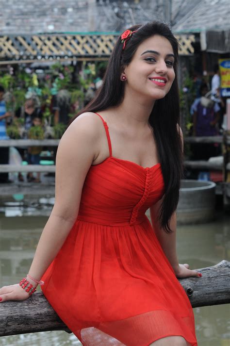 aksha sexy cleavage show in red hq pics n galleries