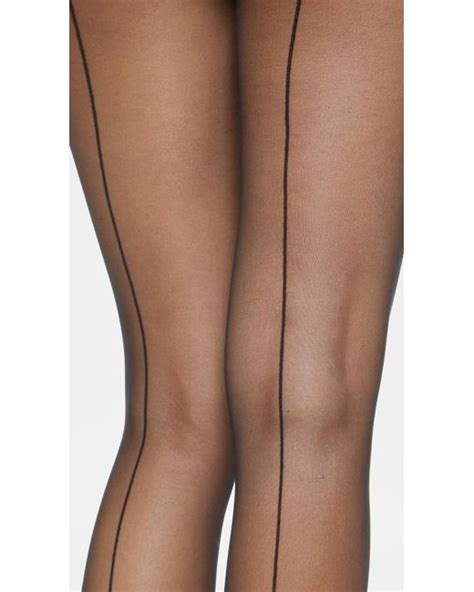 lyst wolford individual 10 back seam tights in black