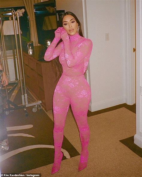 kim kardashian shows off her hourglass curves in a sheer lace pink