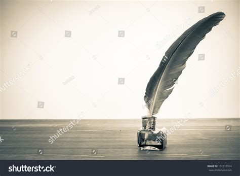 vintage background quill  inkwell  stock photo