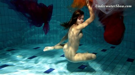 Fire Redhead Girl Named Edwige Swimming Naked In A Pool