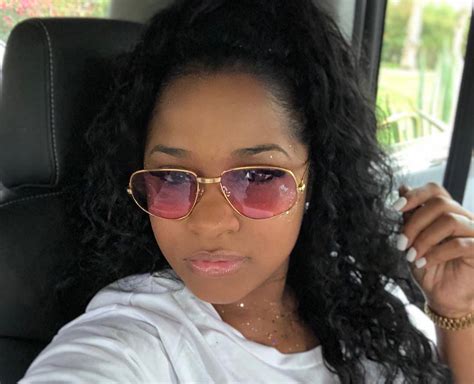 toya wright shows off a classy outfit while sending a