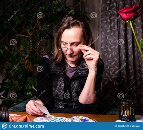 Mature Woman With Glasses Divines On The Cards Stock Image Image Of