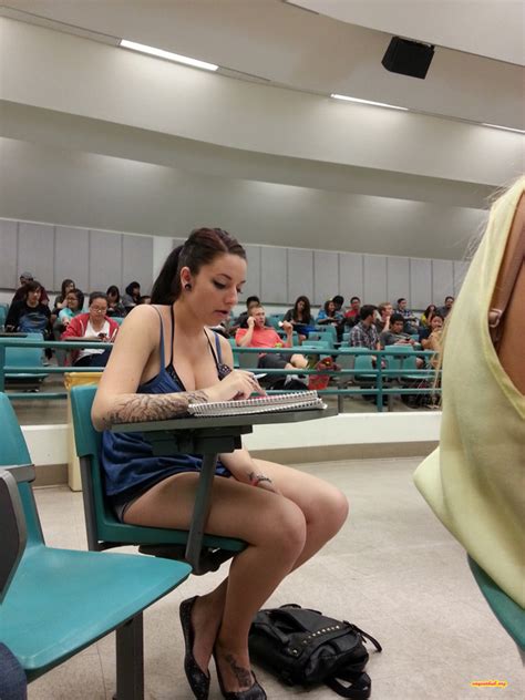 big tits cleavage proudly being displayed in class by a cute college girl