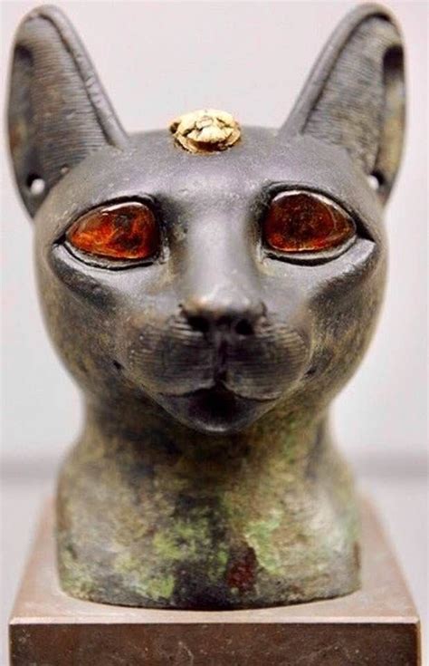 The Ancient Egyptian Goddess Bastet With Amber Eyes