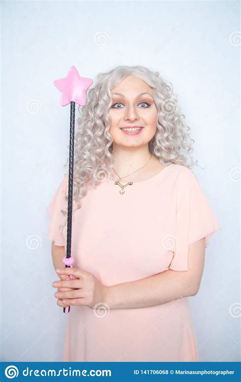 kinky pretty woman with pink star riding crop cute blonde