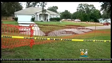 sinkhole opens up in spring hill florida cbs miami