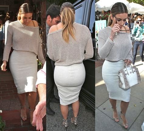 Kim Kardashian Shows Off Booty In Tight White Pencil Skirt