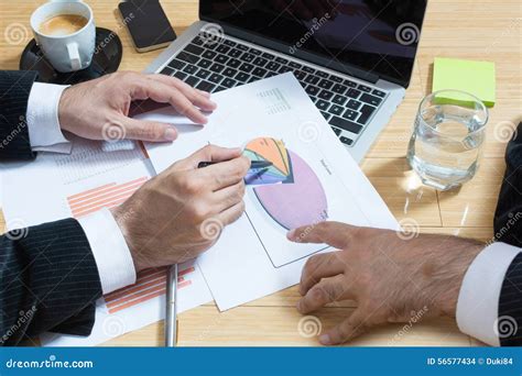 analysing data stock photo image  businessman discussing