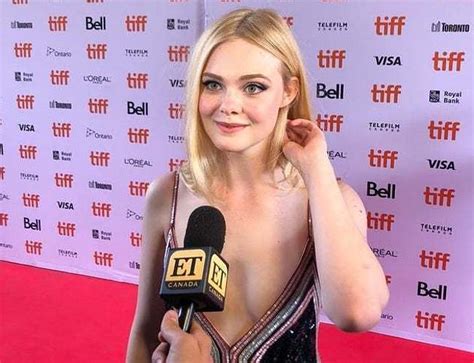 elle fanning low necked dress and hot bikini photos