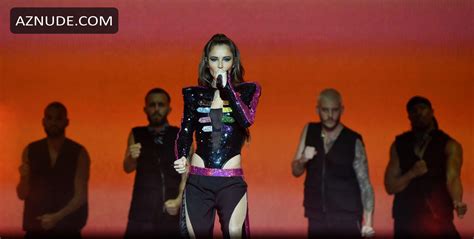 Cheryl Cole Shows Off Her Cleavage While Performing On Stage Live At