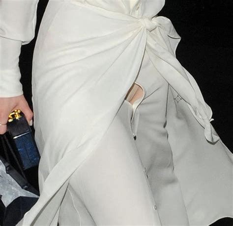 lily james flashes her knickers as she attends kensington palace bash