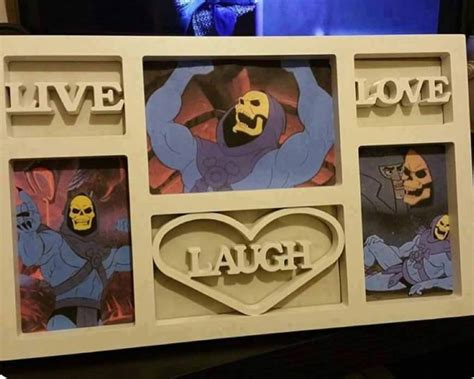 Adding Skeletor Improves Crappy Picture Frames By About 5 000 The Poke