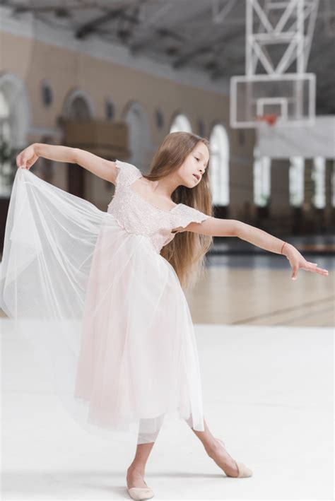 little cute ballerina girl dancing on floor photo free download