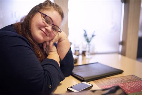 Chubby Teacher Sitting In A Bright Coffee Shop Stock Image Image Of
