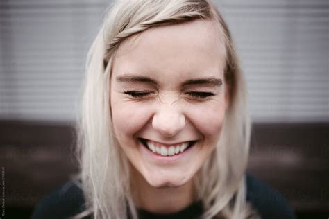 Portrait Of A Happy Blonde Girl Stocksy United