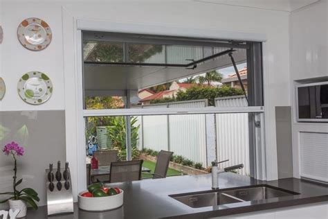 gas strutted awning windows gold coast kitchen servery awning sillless window awning windows