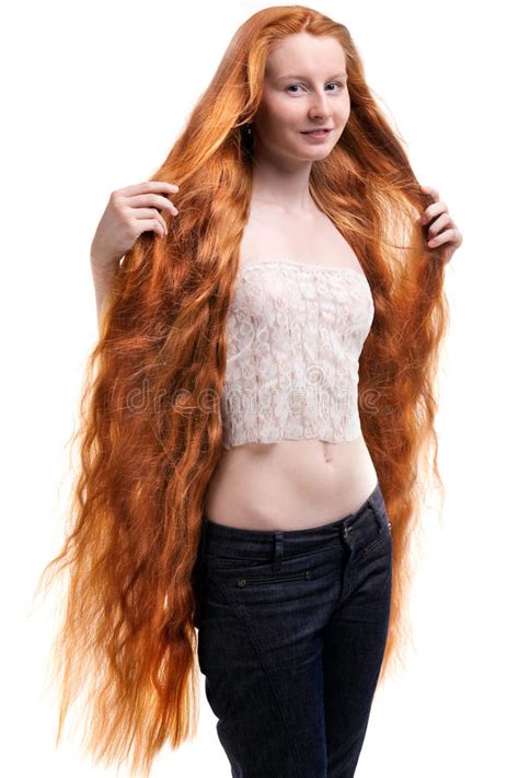 Teenage Girl With Extremely Long Red Hair Stock Image