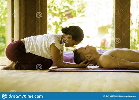 Attractive Woman Giving Head Massage To Man Royalty Free Stock