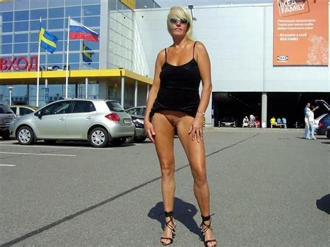 flashing nude photo of mature blonde wife in public place