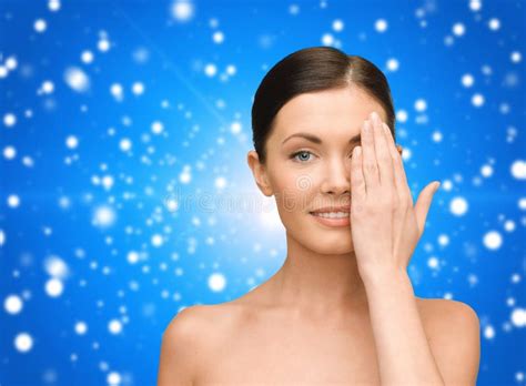 smiling young woman covering face  hand stock image image  cosmetics cosmetology