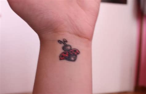 ladybug small girly wrist tattoo designs sheideas