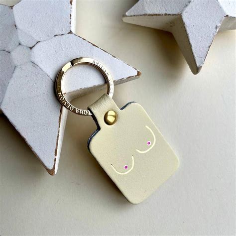boobs leather keyring in cream by nest