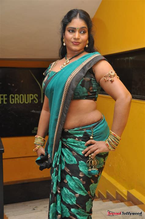 Piczplaza Actress Jayavani Stills At Minugurulu Audio