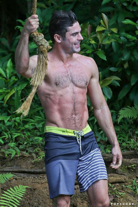 Shirtless Zac Efron On A Rope Swing Popsugar Celebrity