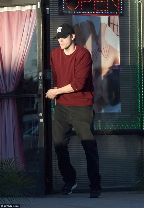 ashton kutcher seen leaving hollywood massage parlour after solo visit daily mail online